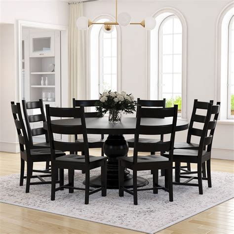 Black round dining table PenalbaWeb.com