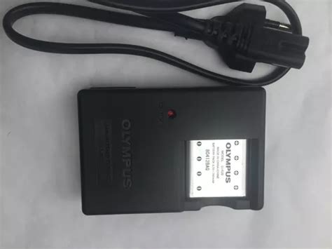 Cargador olympus PenalbaWeb.com
