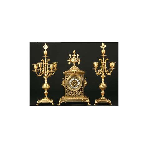 Reloj candelabros bronce PenalbaWeb.com