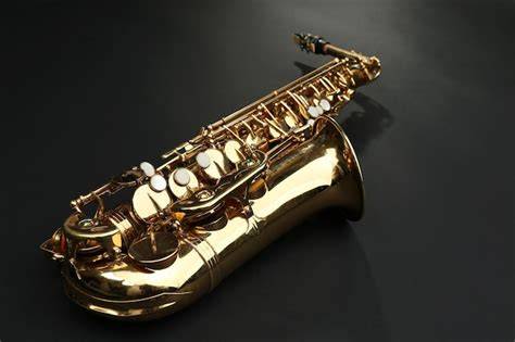 Saxofon dorado PenalbaWeb.com