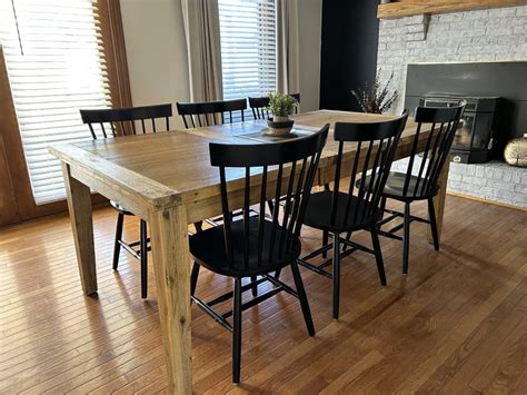 Wood table black chairs PenalbaWeb.com